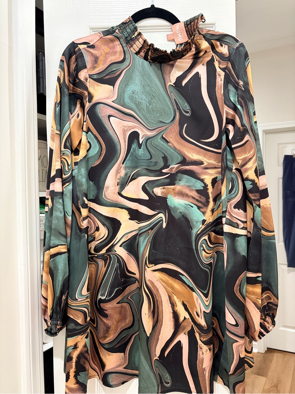Show meWomen's Marble Print High-Neck Tunic Dress lllow